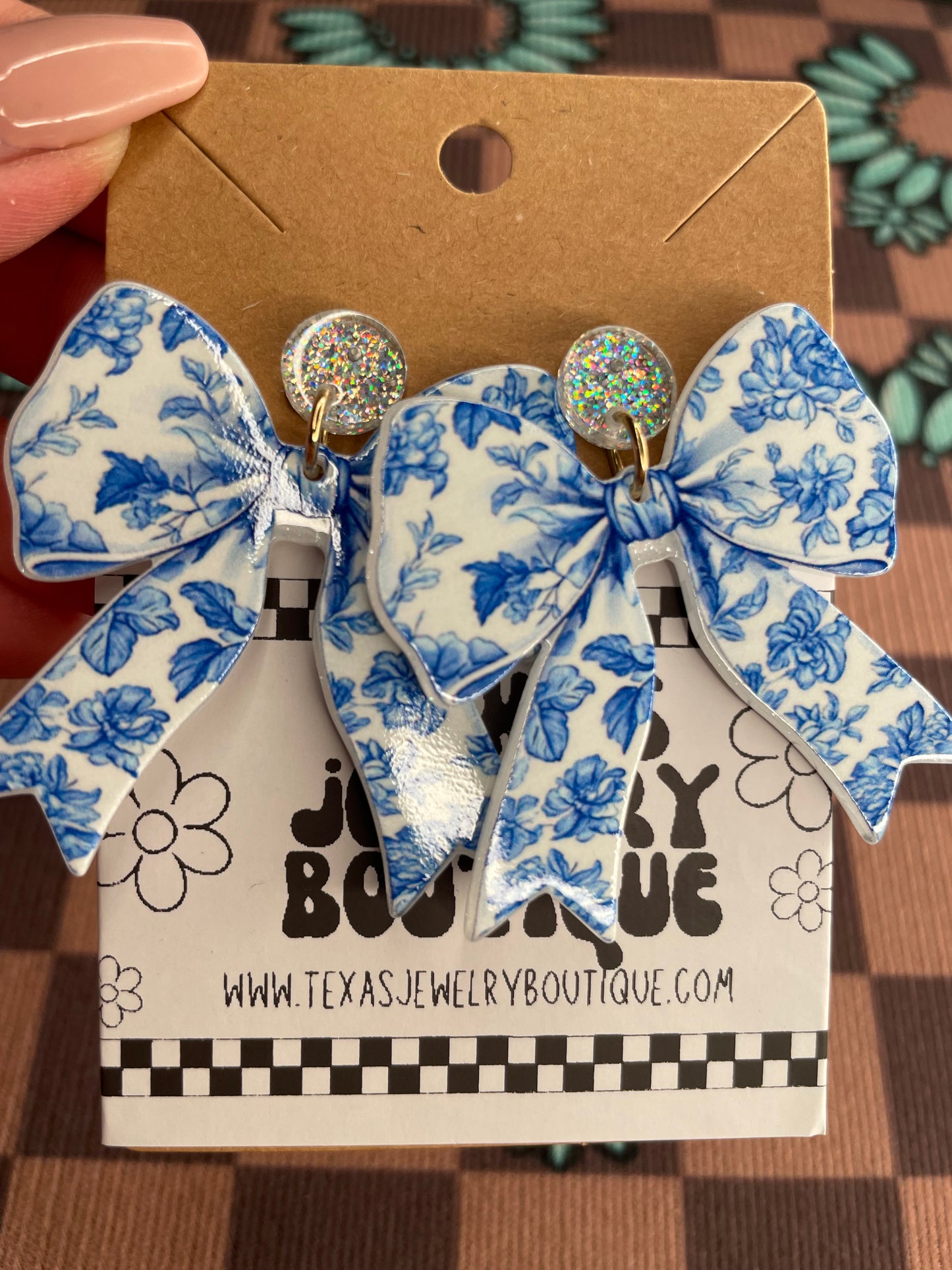 Blue floral bow earrings